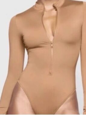 SKIMS Zip-Front Long Sleeve Bodysuit in Camel
